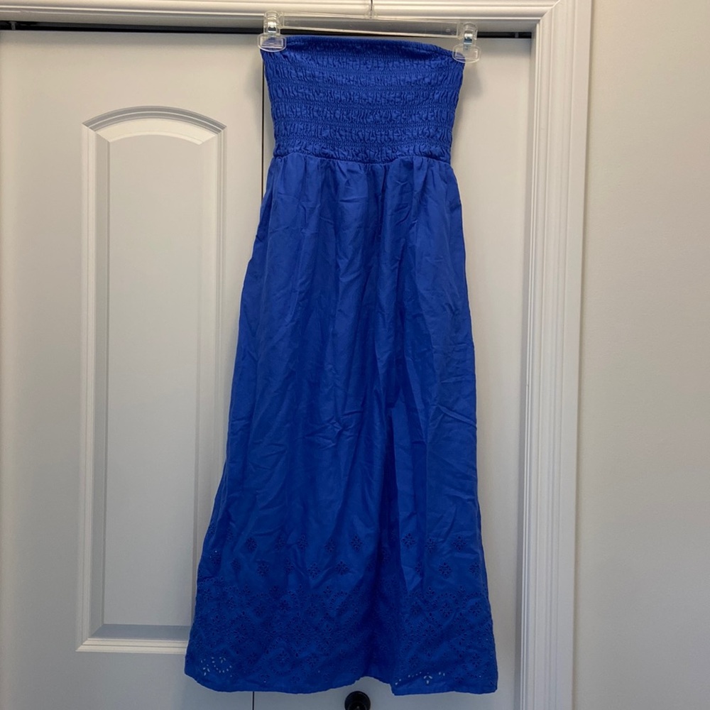 Blue strapless maxi dress with eyelet detail on bottom